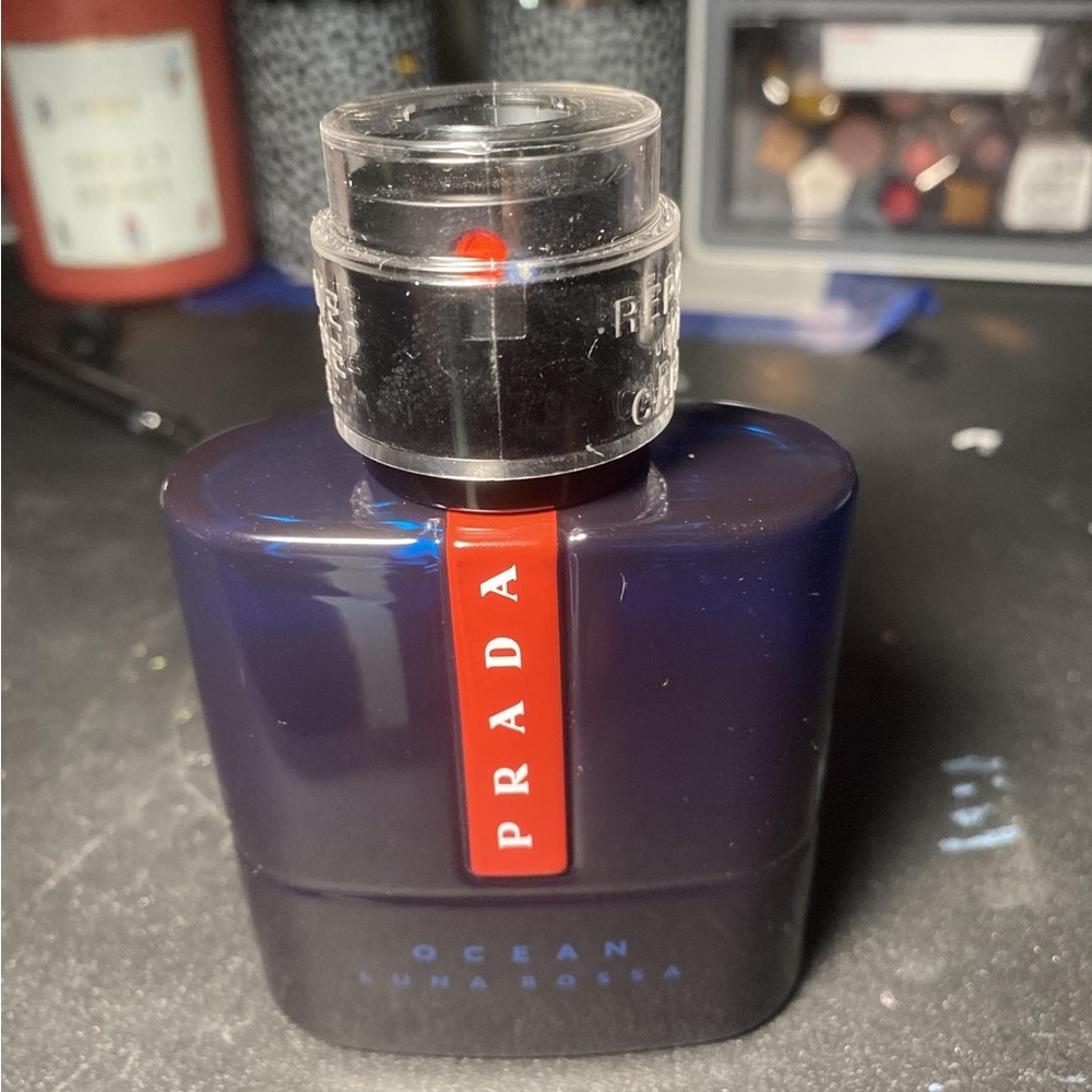 SLIGHTLY used Bottle PRADA ocean EDT.  1.7 FL OZ.